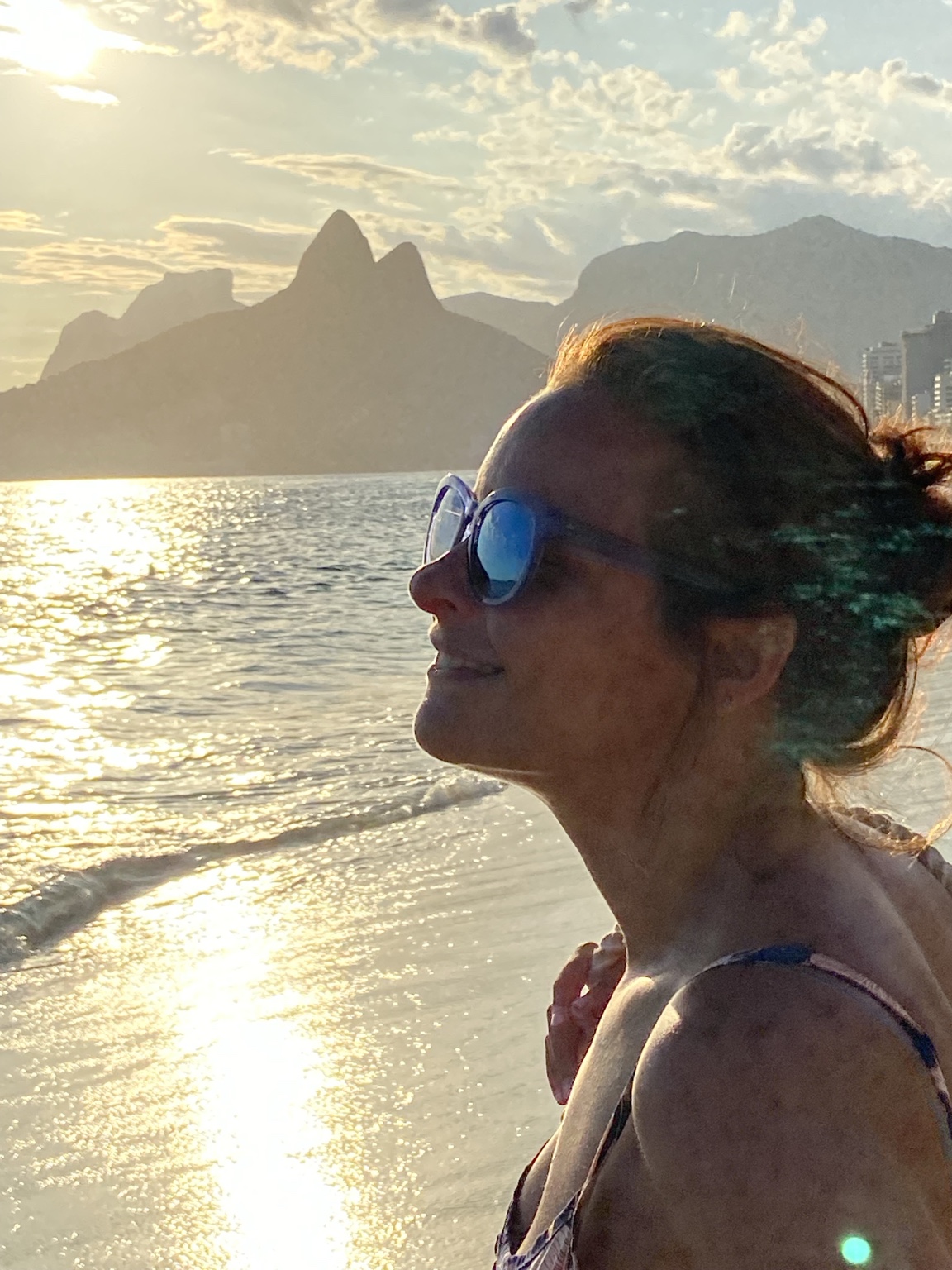 Juliana looking toward the sea at sunset